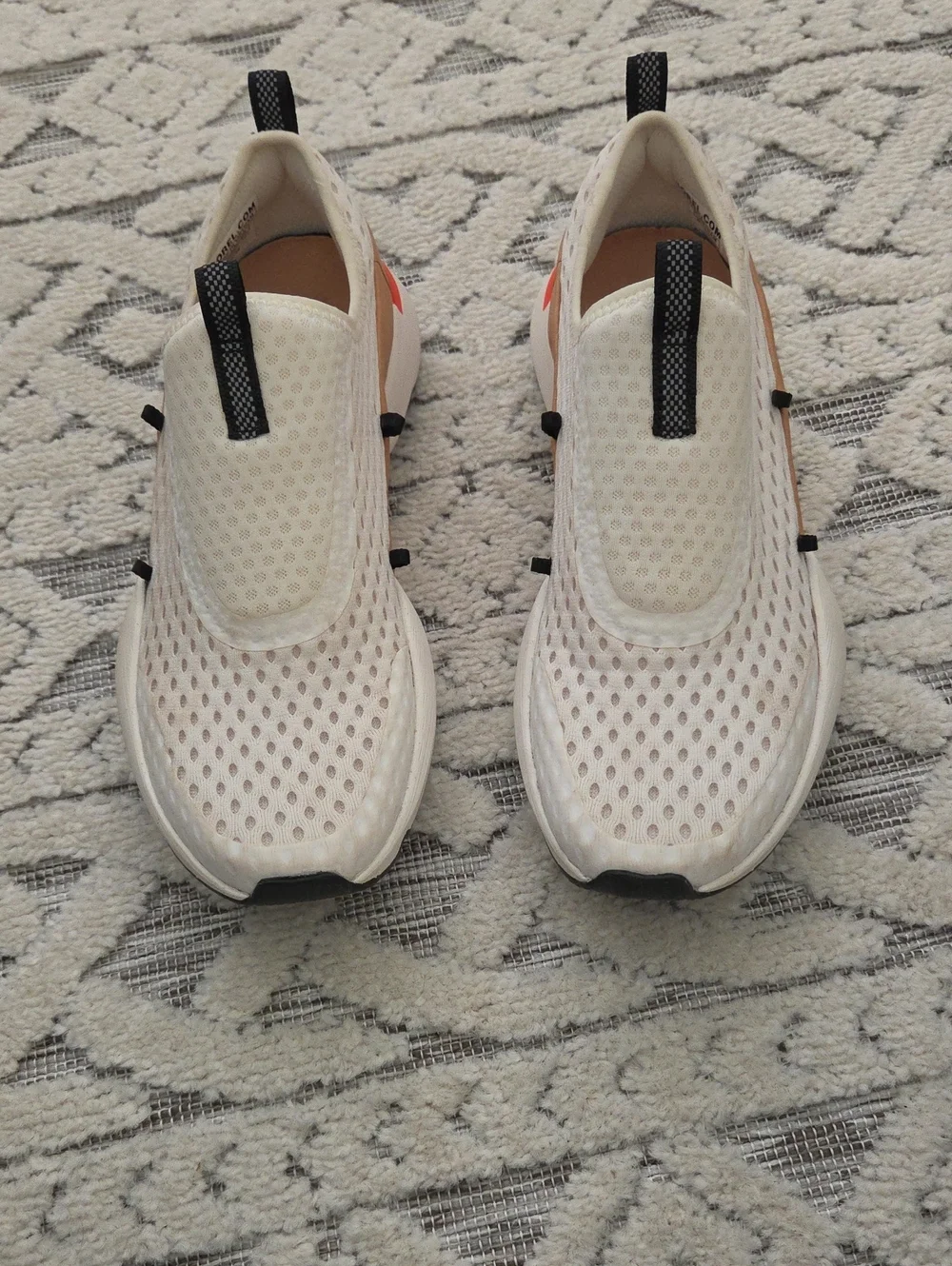 Sorel Slip-On Sneakers in White and Tan with Black Logo